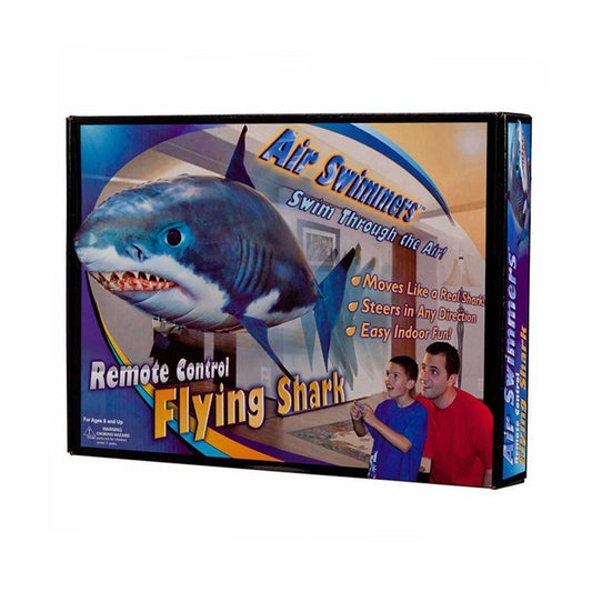 Tap Once remote control flying shark balloon toy in packaging with a child and adult playing indoors